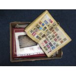 Box of world stamps, buyer collects