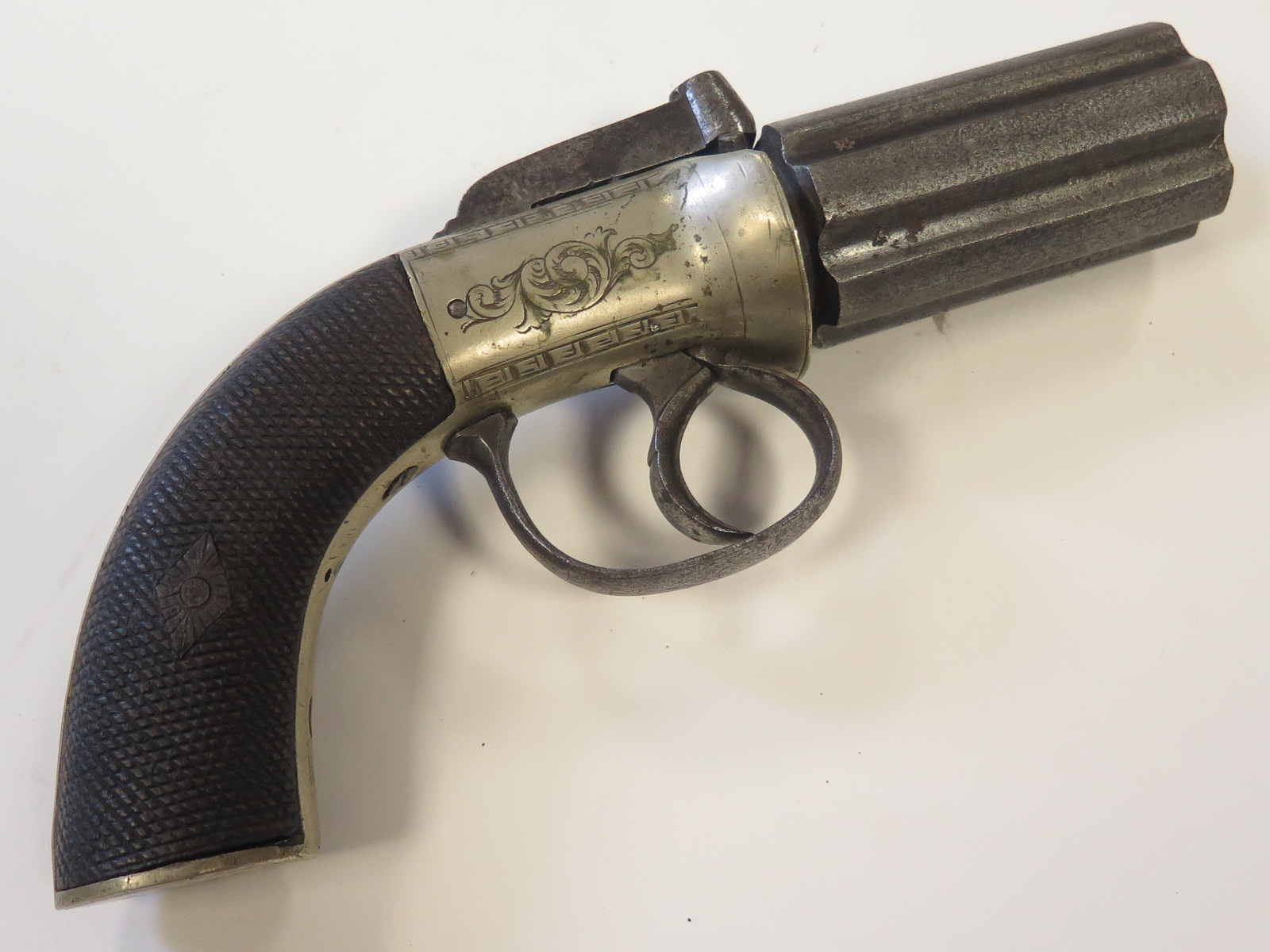 19th Century 6 cylinder percussion pepperbox revolver with white metal frame chequered grips