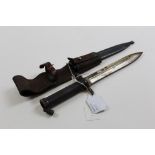 Bayonet: A good Swedish Model 1898 knife bayonet in its steel scabbard with original leather frog.