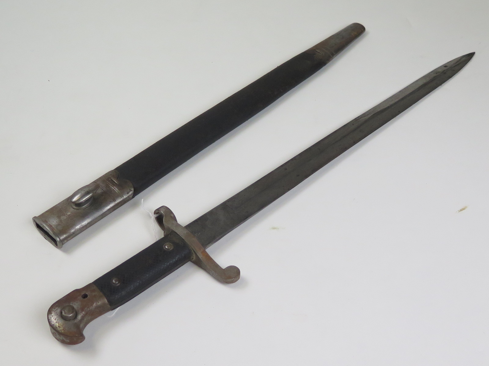 Bayonet: An 1887 MKII sword bayonet for the Martini Henry rifle. W/D marked and made by Wilkinson.