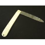 Knife: A single bladed lock knife with Ivory handle. Blade 6'' and marked ''Morley & Co'' Worn but