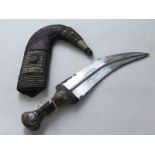 Arabian styled old Jambiya dagger, wooden handle, leather scabbard and silver decoration, with