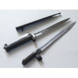 Bayonets: 1) Swedish Pattern 1896 knife bayonet in its steel scabbard in good condition. 2)