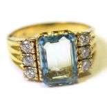 18ct Ring set with Large aquamarine and 2 rows of Diamonds size U weight 13.5 grams