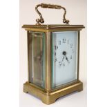 French Five glass gilt brass carriage clock with repeater, the white face with black Arabic numerals