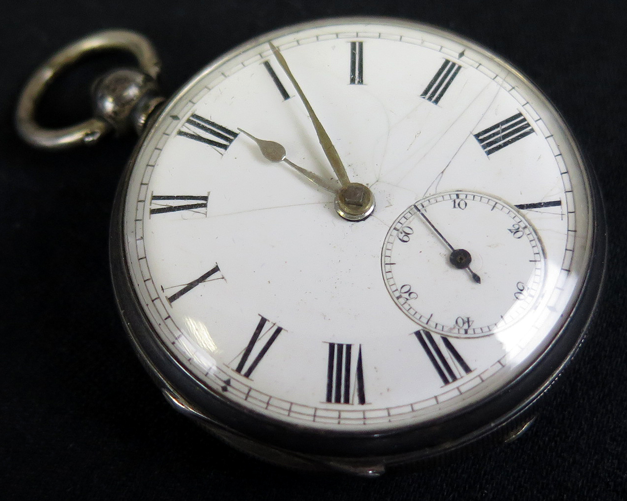 Silver Pocket watch, hallmarked London 1873, the white enamel dial applied with black roman