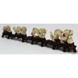 Rare 19th century Ivory Dragon Train made up of four dragons in ascending order all chasing the