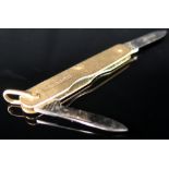 Pen knife in fully hallmarked 9ct Gold, marked JTC 9 .375 Birm 1931.