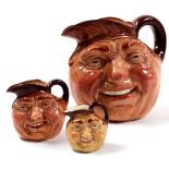 Three Royal Doulton Toby jugs, all "John Barleycorn old lad" types. Various sizes