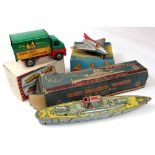 Two Wells-Brimtoy vintage tin plate toys in boxes, wonderjet and a truck. Together with a Marx