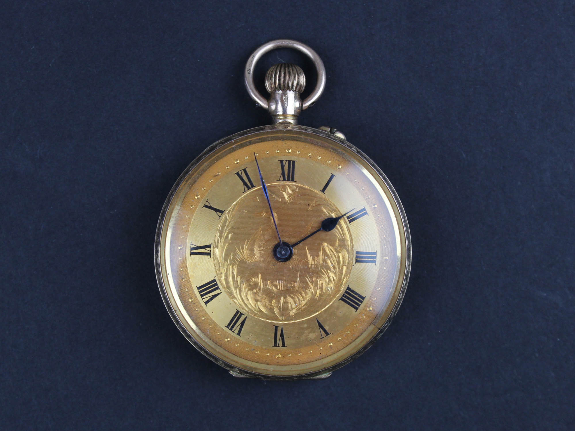 Ladies 9ct gold pocket watch, gilt dial with roman numerals surrounded by minute track, the dial