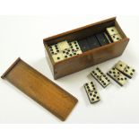 Carved wooden box with a full set of bone/wood dominos