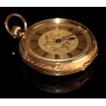 Ladies 18ct gold pocket watch the gilt dial with black roman numerals, foilate design in centre
