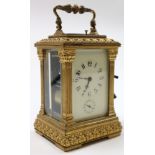 Five glass brass carriage clock with black Arabic numerals on a white face approx height not