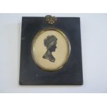 Georgian Silhouette miniature of a lady heightened in gilt within a ebonised frame entitled verso