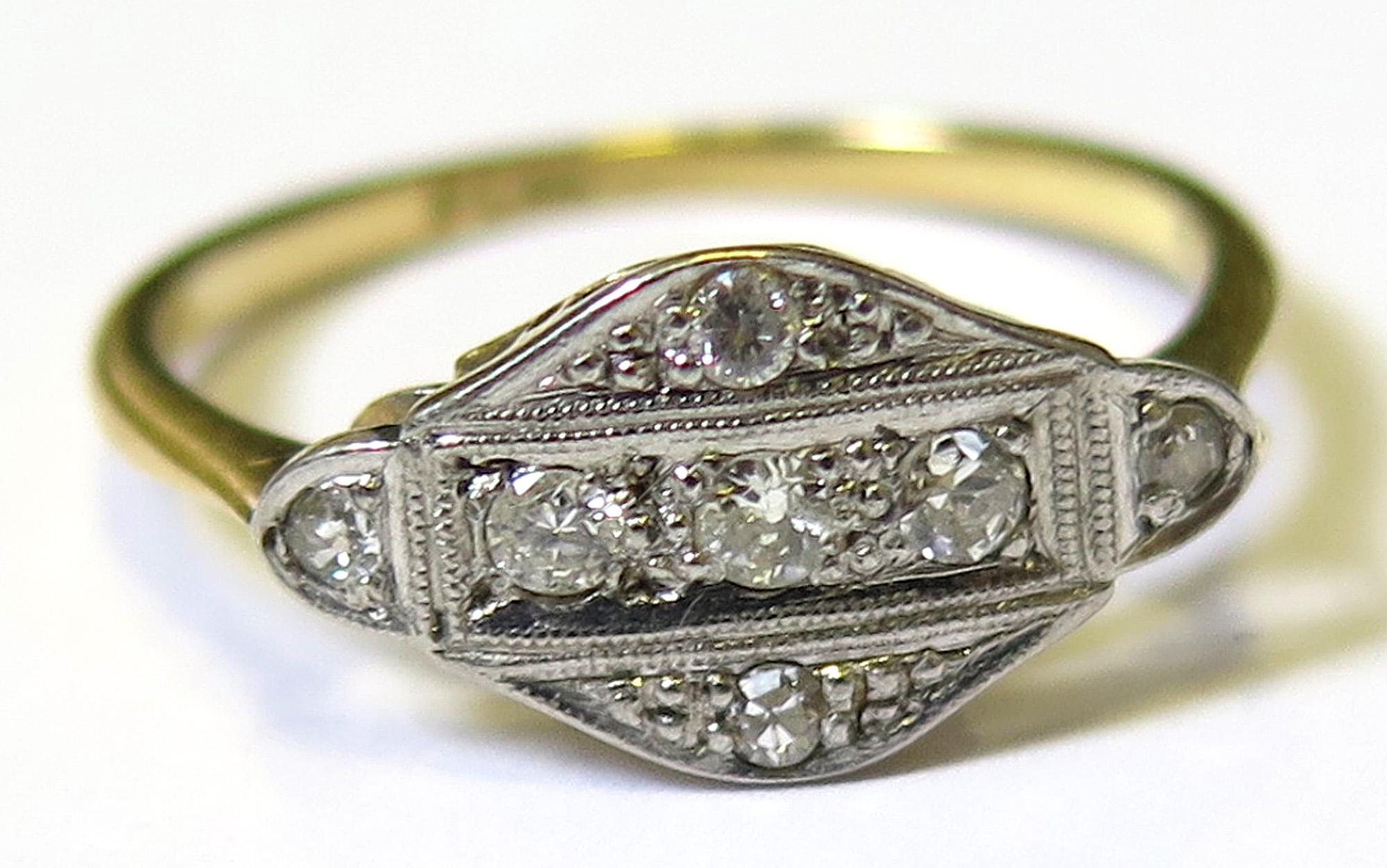 18ct & Pt. Art Deco Style Ring set with 7 Diamonds size O weight 2.4 grams