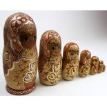 Vintage hand made matryoska set of nesting dolls, seven in total signed and with inscription.