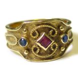 14 ct Ring set with sapphires and ruby size P weight 6.1 grams