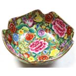 Chinese Porcelain Bowl. Mid 20th century with million flowers. 24.5 cm across. Gilt enhanced edge'