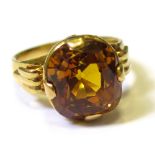 Yellow metal Ring set with large Citrine size O weight 11.2 grams
