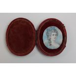 Early victorian portrait miniature on ivory of a young lady dressed in blue. Loosely presented in an