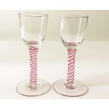Glass - small Cordial ? Glasses - coloured pinkish and white Twist Stems (one chip on base) (2)