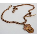 9ct Gold "T" bar pocket watch chain with a sporting medal attached. length approx 37cm and