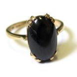 9ct Ring set with black onyx cabochon stone size W weight 6.1 grams