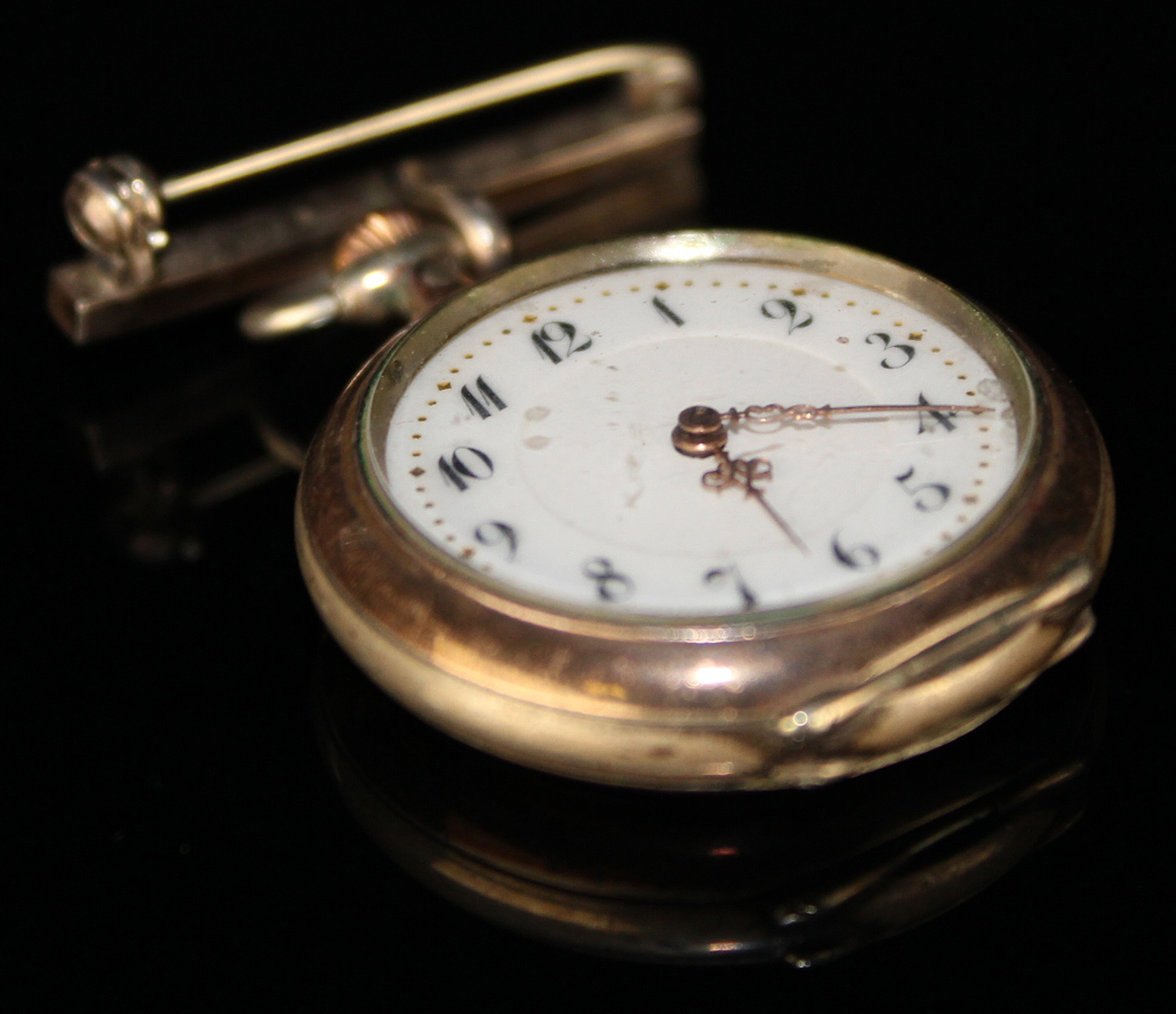 Silver Ladies Fob Watch on a Silver pin bar, White enamel face with Arabic Numerals weight 28.1