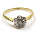 18ct Ring with Diamonds set in a floral pattern size N weight 1.9 grams