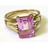 Yellow metal (tests as 18ct) pink baguette Sapphire ring size O weight 5.1 grams
