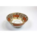 Regency period slops bowl decorated in gilt and orange