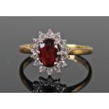 18ct gold ring with central synthetic red stone surrounded by diamonds size N weight 3.4 grams