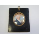 Mid 19th century colour miniature of a gentleman housed within typical ebonised frame