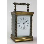 Five glass brass carriage clock with black Roman numerals on a white face approx height not