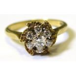 18ct Gold ring cluster set with 7 diamonds size P weight 4.6 grams