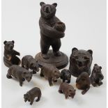 Assortment of black forest carved wooden bears