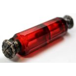 Victorian ruby glass double ended scent bottle with silver caps at each end