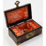 Wooden Chinese box with inset jade disk silk lined interior and padlock