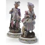 Two continental porcelain figures of a man and a woman