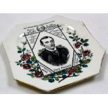 Fred Archer, an octagonal pottery plate by Wallis Gimson, printed in black with a named and