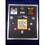 Music memorabilia, a collection of 13 framed badge compilations, each one featuring a group or music