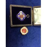 Football, a Middlesex Wanderers button hole badge, red and white enamelling , Fattorini name to