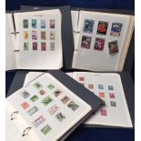 Stamps, a collection of Worldwide stamps in four folders, all mounted on stamp album pages,