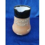 Advertising, Dewar's Whiskey Doulton jug, brown glaze with raised writing & decoration, 18cm tall (