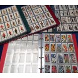 Cigarette cards, four folders containing a collection of mostly Player's & Will's sets inc Player's,