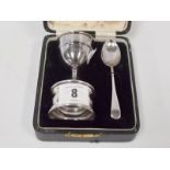 Silver matched three piece christening set, comprising egg cup, napkin ring and spoon, original