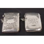 Two Edwardian silver vesta cases, one foliate engraved, the other with monogram, both Birmingham