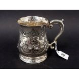 George II silver mug of baluster form, with scroll handle, later foliate C scroll embossed, maker