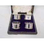 Cased set of four silver napkin rings, Birmingham 1934, 4oz approx.